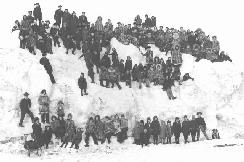 School faculty and pupils on hummock. School pupils of Nome Public School, on Bering Sea, April 19, 1910. 